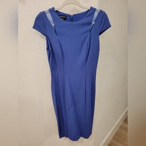 Bebe form fitting dress with cutouts